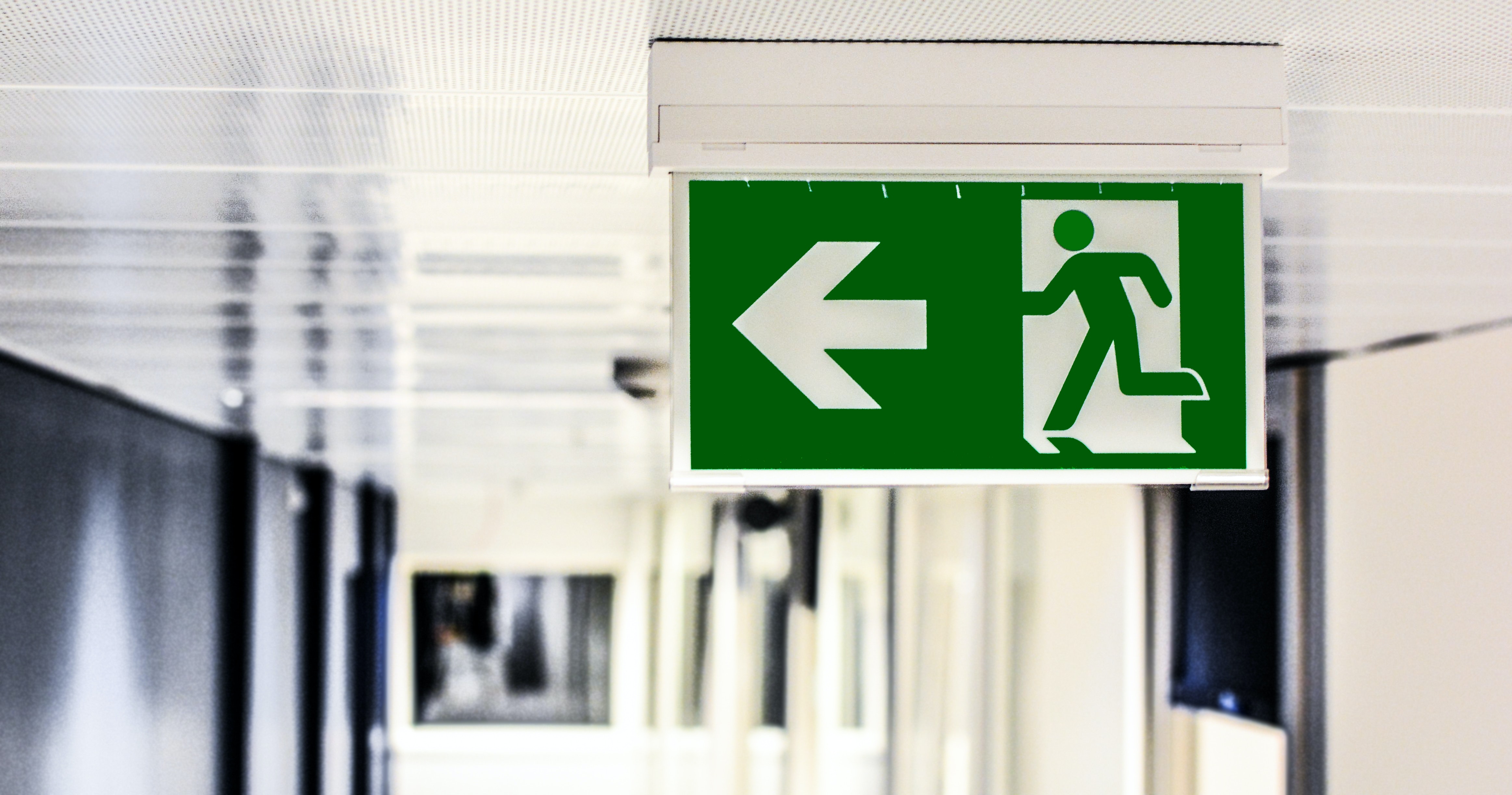 green-and-white-male-gender-exit-signage